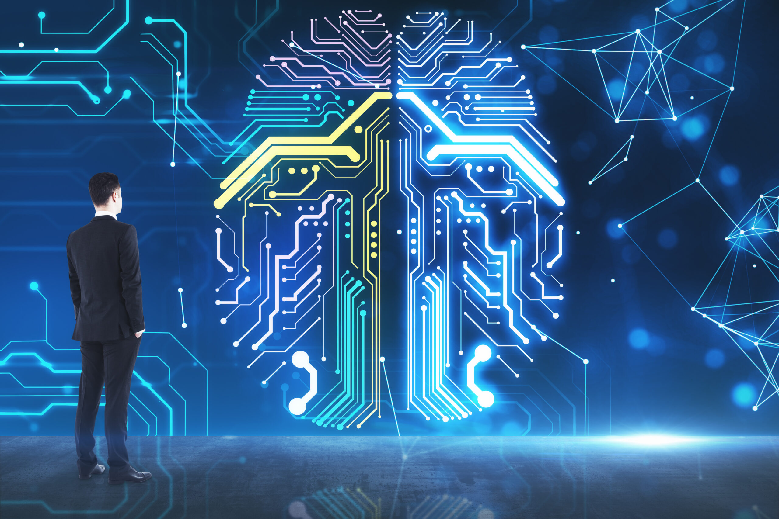 Business leader viewing futuristic AI brain interface representing enterprise AI strategy, digital transformation, and intelligent decision-making.